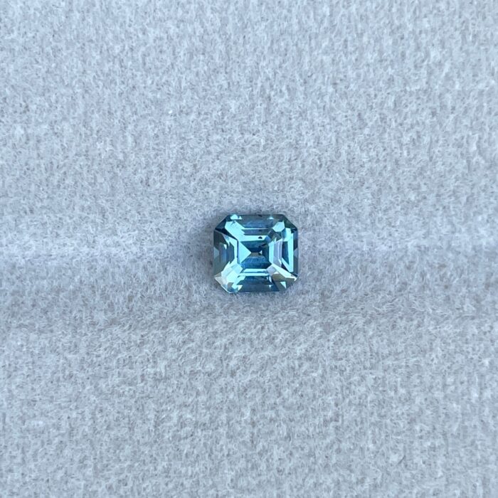 Teal sapphire | natural, bluish green, Emerald cut, VVS, 0.78ct, Madagascar