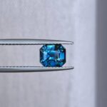 Teal Sapphire Emerald Cut 1.74 carat, showcasing vibrant blue-green hues.