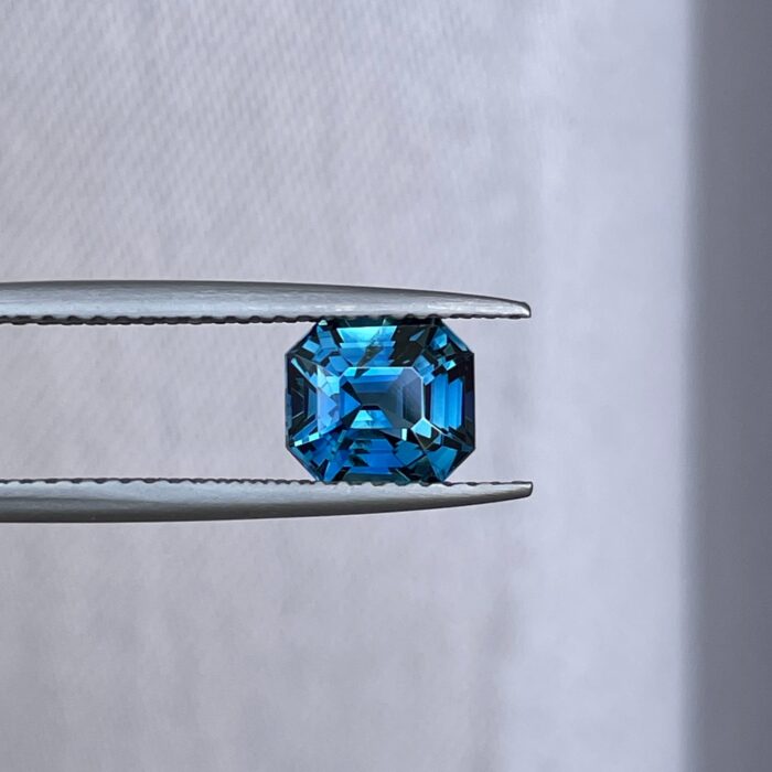 Teal Sapphire Emerald Cut 1.74 carat, showcasing vibrant blue-green hues.